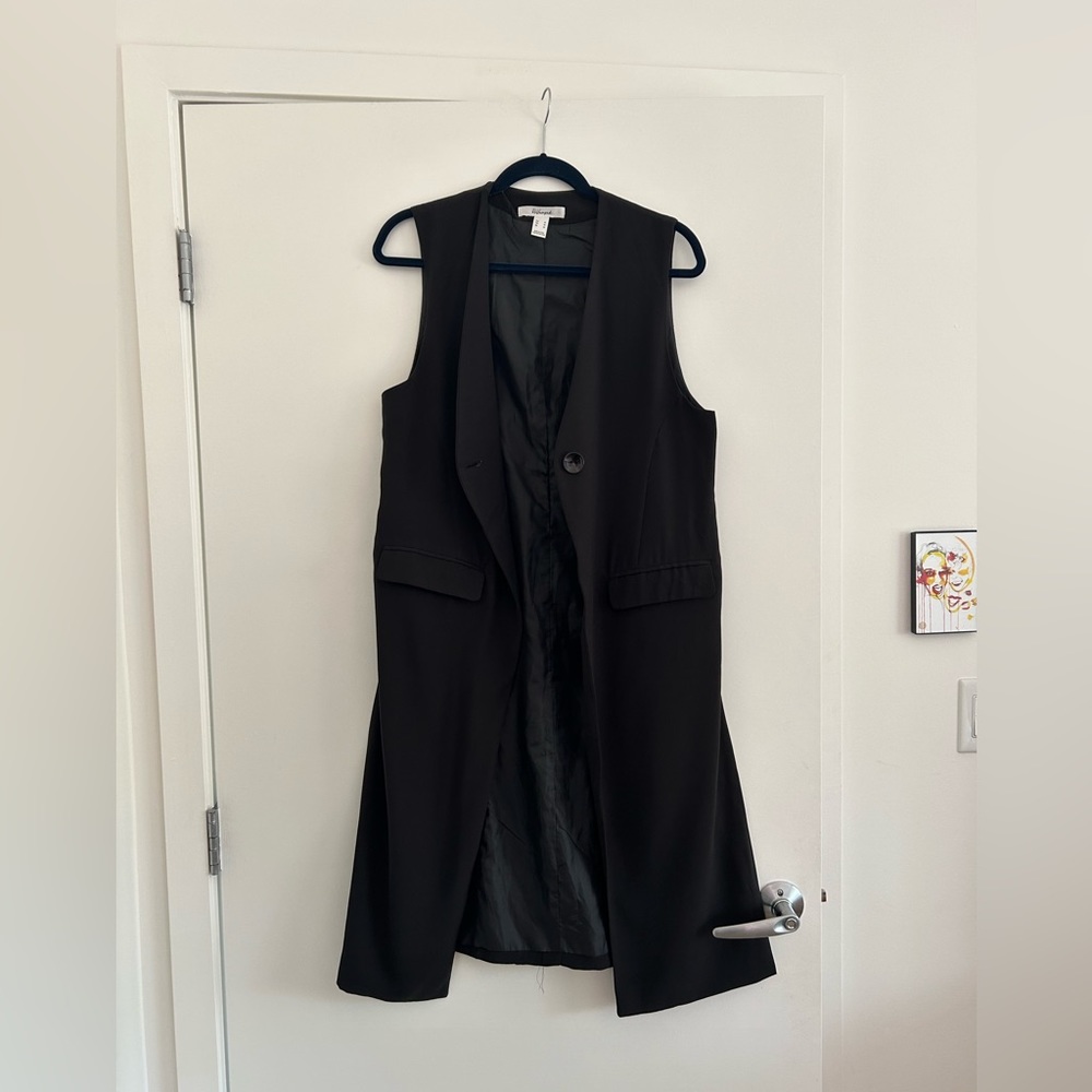 Knee length black vest